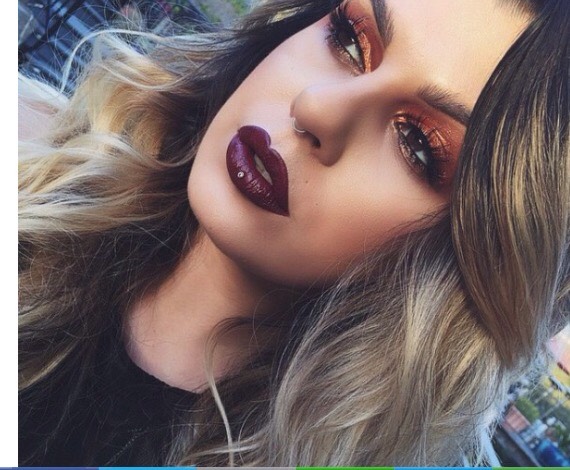 7. Copper eyeshadow, bold brows, dark vamp lip. 