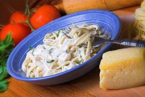 3. Fettuccine Alfredo 
This classic Italian American restaurant dish is packed full of calories and extra fat. The original dish is just Parmesan mixed with butter, but modern versions are filled with heavy cream too. Pasta doesn’t have to be an unhealthy meal. 
