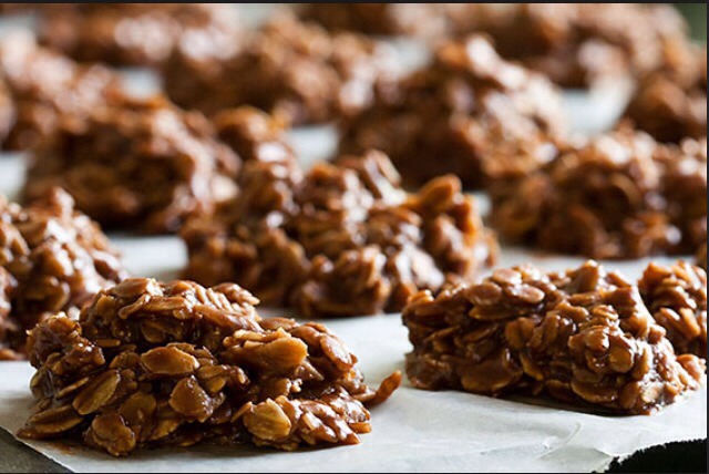 In a heavy saucepan, bring the sugar, cocoa, butter, and milk to a boil. Let boil for one minute, then add the peanut butter, vanilla, and oatmeal. Turn the stove off and drop spoonfuls of the mixture onto waxed paper . Wait until they dry and harden, and then they're ready to eat!(: