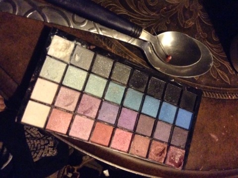 So youll need:
1. A spoon
2. A slightly smaller spoon
3.a saftey pen or a toothpick
4.A napkin for messsy messy
5.eyeshadow and a container to put it in
In this case im puting it back in its original container 