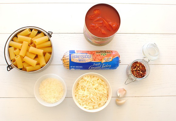 INGREDIENTS (contd.)
1 tablespoon extra-virgin olive oil
1 pound ground turkey
3 cloves garlic, minced
1 pinch crushed red pepper flakes
1 pinch coarse salt and freshly ground pepper
1 (28 ounce) can Muir Glen organic whole peeled tomatoes, crushed with your hands
1 pound rigatoni pasta