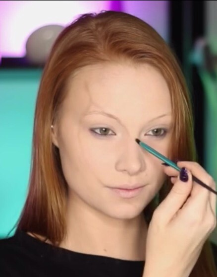 First apply foundation all over your face . Then outline softly, where the hole of the skull is going to be with a light brown .  Also blend out the top line a bit as well as the line on the left .