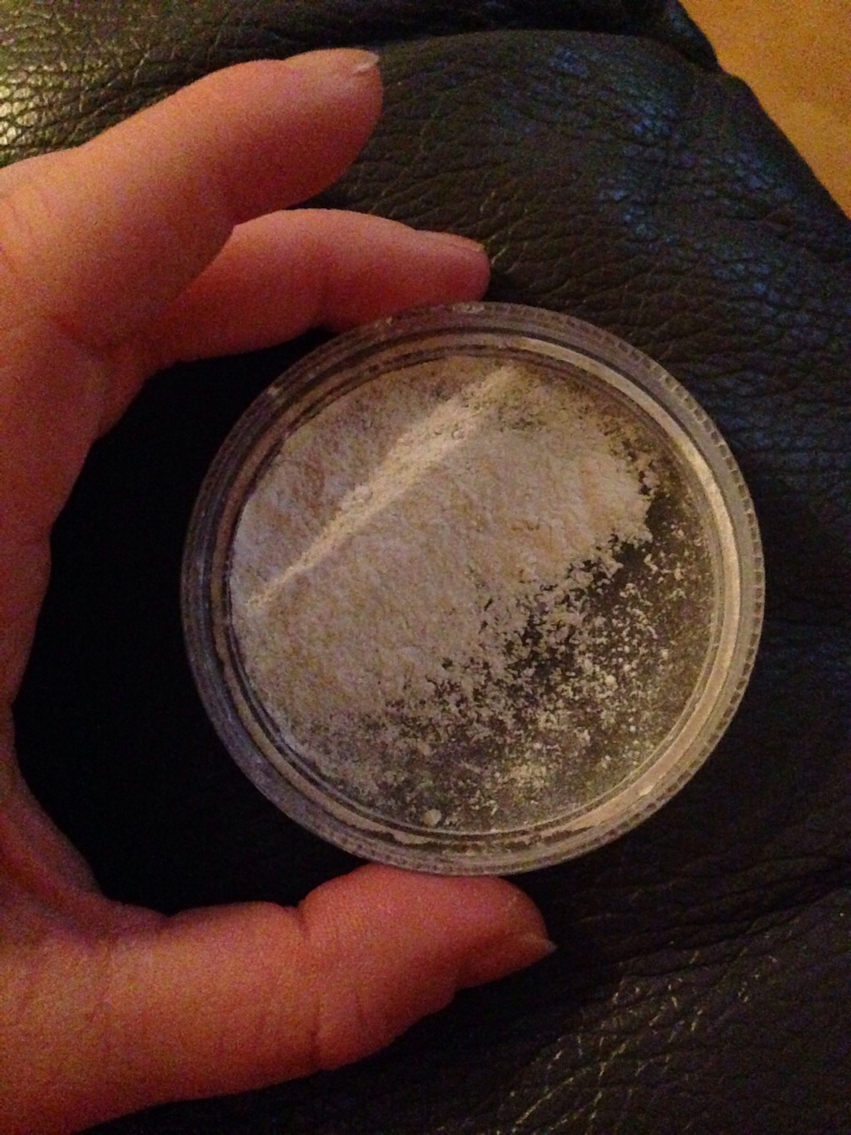 Simply use an old/empty powder container to hold the talc, or use the lid of any powder containers you own if you don't have any empty ones. Make sure once you've put your brush into the talc that you tap it off! There will be a lot of excess on first dab!