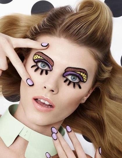 25. Pair your eye makeup with your nail art design, playing with a purple shade. Make your brows in a brown shade and line them with black liner. Apply purple and yellow eyeshadows with black dots on them. For the final look, apply false lashes on the bottom lashes.