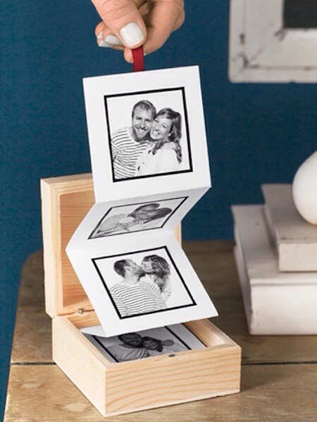 11. Pull-Out Photo Album
A great alternative to your traditional photo album! You can buy those little wooden boxes online, but they are also available at craft stores like Hobby Lobby. The rest is made with card stock and photos. I would call it a “memory box”.