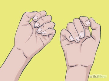 4) Notice how much better your nails look. If you start biting your nails again, put the adhesive bandages back on.