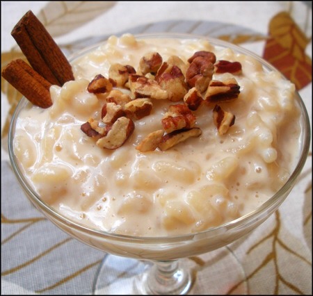 In a saucepan, combine 3 cups milk, 2 cups cooked white rice, 1/2 cup raisins, 1/3 cup sugar and a generous pinch each ground cinnamon and salt. Bring to a boil, then lower the heat and simmer, stirring occasionally, until the milk is absorbed and the pudding is thickened, about 20 mins