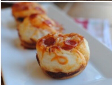 Bake the pizza cupcakes according to the instructions on the dough packet.