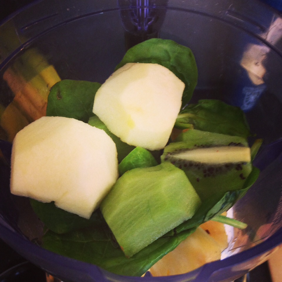 GREEN SMOOTHIE! 

Apple 
Kale 
Kiwi
Pear
And pineapple :) 