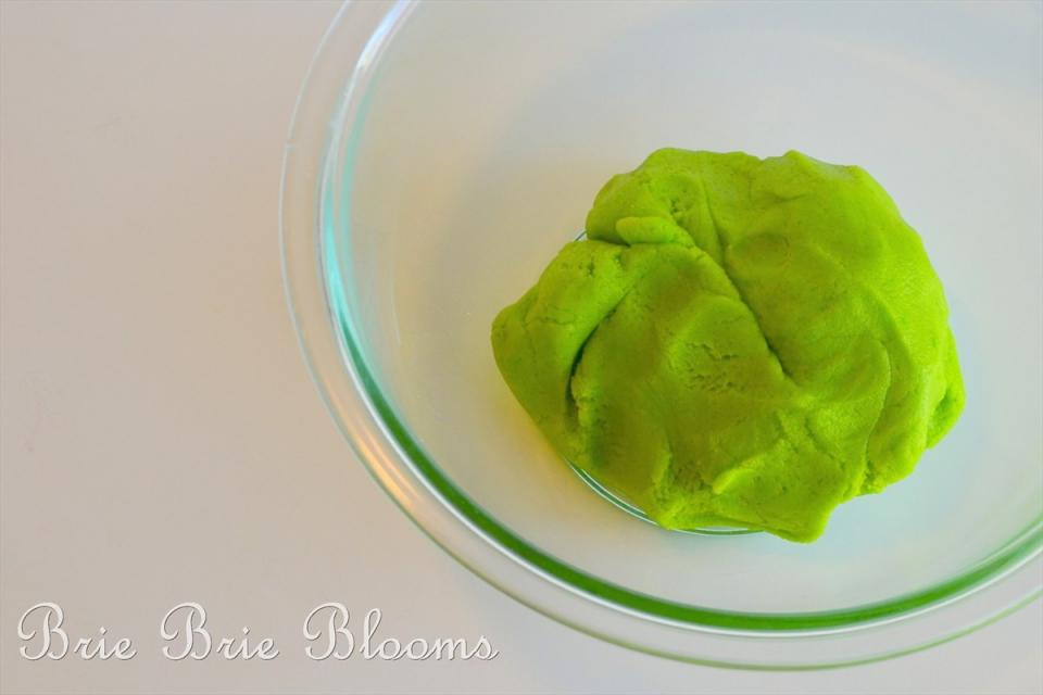 Begin by coloring your sugar cookie dough with the green dye. A bright lime green is perfect for your Frankenstein cookies.