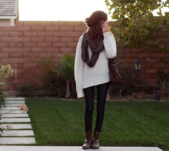 Wearing big sweaters.