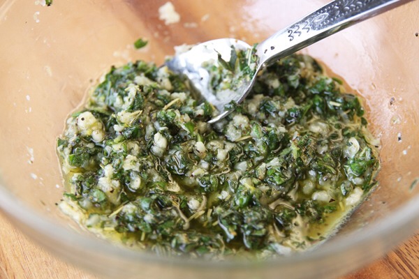 Mix up a bunch of minced garlic, your finely minced herbs a little salt and pepper, and the zest and juice from one large lemon (or a couple of smaller ones).  Then mix in some olive oil just until it’s sort of a loose paste/thick sauce.

