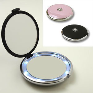 Compact mirror:  For fixing your hair or makeup on the go.