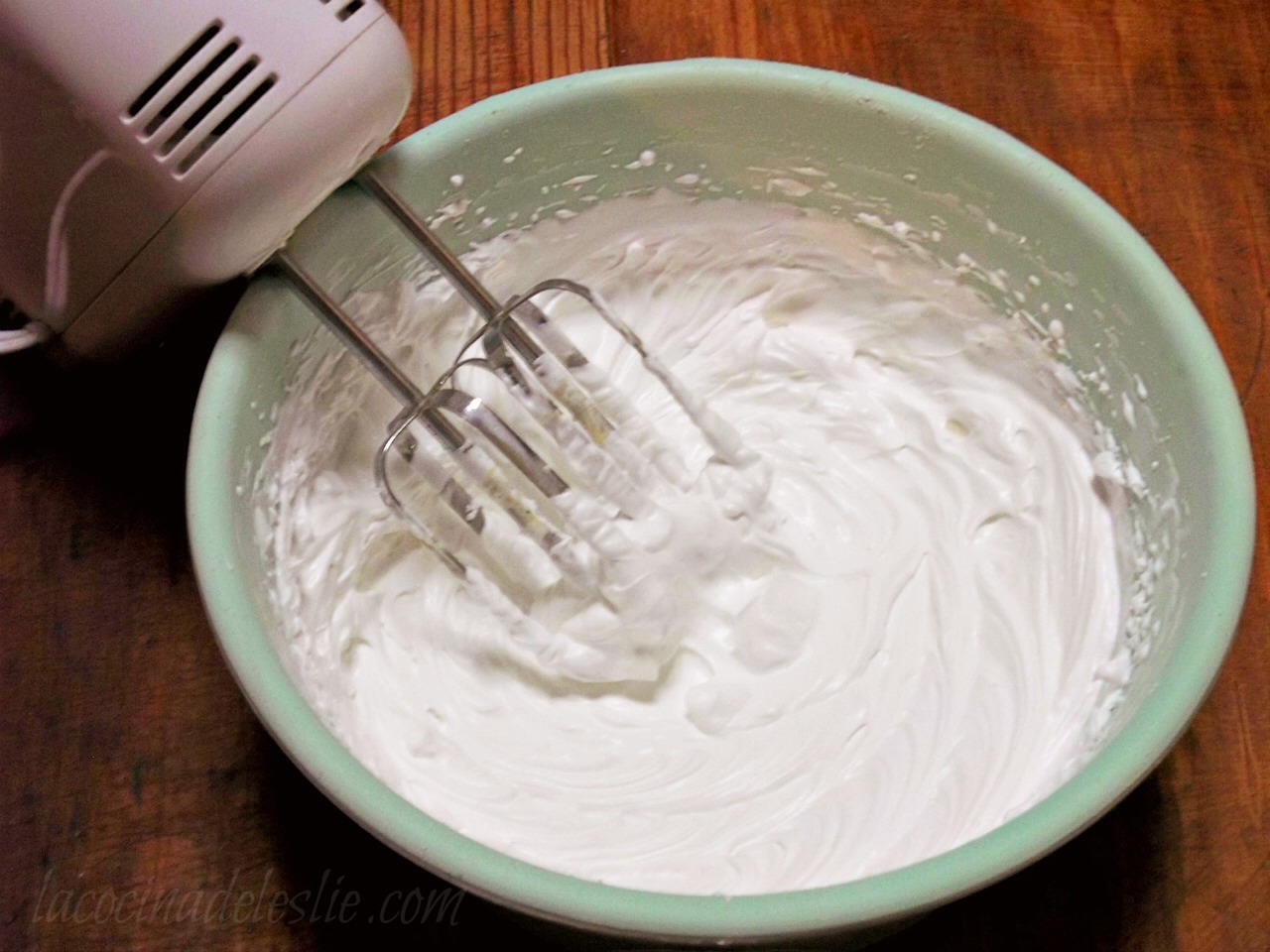 In a large bowl, whip the ingredients with a hand mixer for 10-15 minutes until it's very light and fluffy.