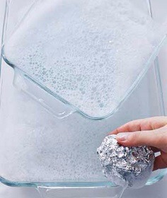 Aluminum Foil as Glassware Scrubber - To get baked-on food off a glass pan or an oven rack, use dishwashing liquid and a ball of foil in place of a steel-wool soap pad