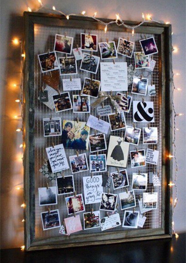 Buy a big picture frame replace the glass with some type of wire, then pin them up. Feel free to add any other feature you want 