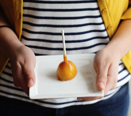 Once the caramel is hard, take them out of the fridge and peel them off the wax paper. If you have a lot of caramel pooled around the bottom, you can cut it away with a knife. Then, enjoy the sweet fruits of your labor (hardy har).