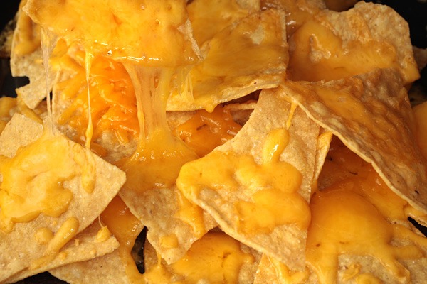 Tortilla chips and melted cheese