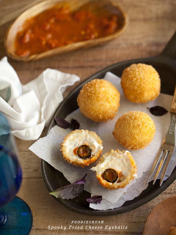 Fried Cheese Eyeballs

Fried cheese balls. Enough said.

http://www.foodiecrush.com/2012/10/spooky-fried-mozzarella-eyeballs-plus-5-scary-recipes/