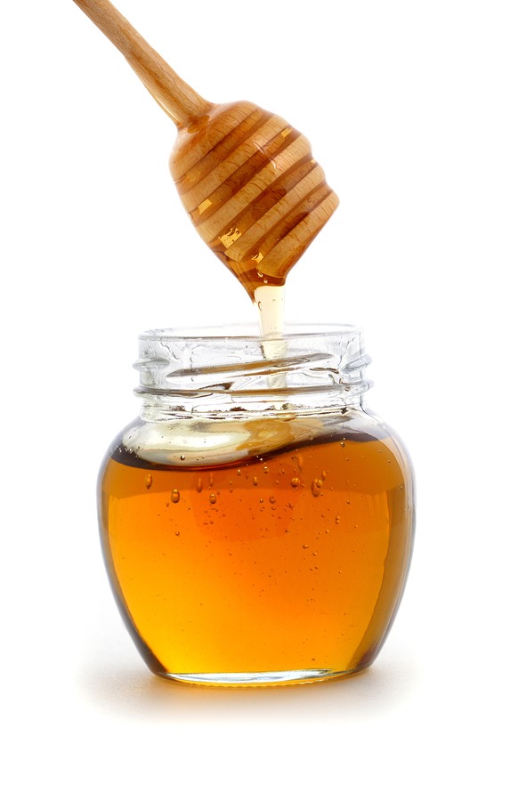 2. Add 2 tbsp of honey to the mixture and with a spoon mix it around until there is no. visible density layer between them...