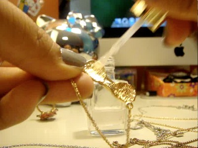 Paint the back of the jewelry that will be on your skin. I apply a couple coats to safe and let it sit and dry. 