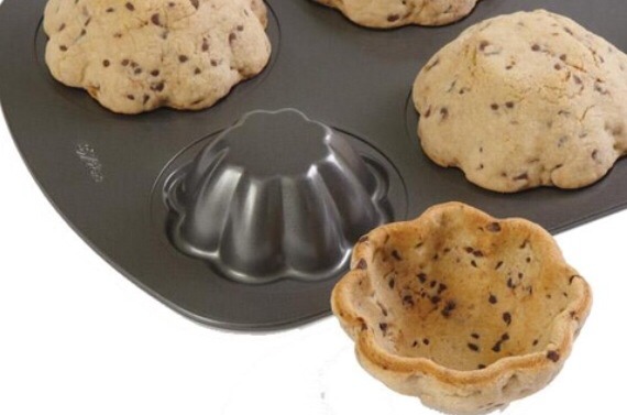 8) turn your muffin pan upside down, BAKE a cookie dough mixture on top and there you have it!! A cute (and edible) cup to serve ice cream :D