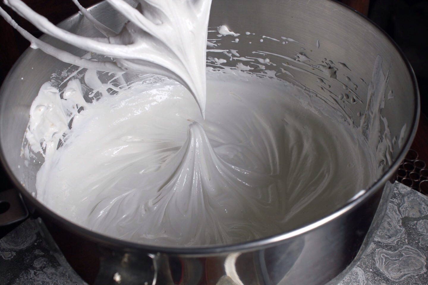 beat in white sugar and continue beating until egg whites are glossy, fluffy, and hold soft peaks