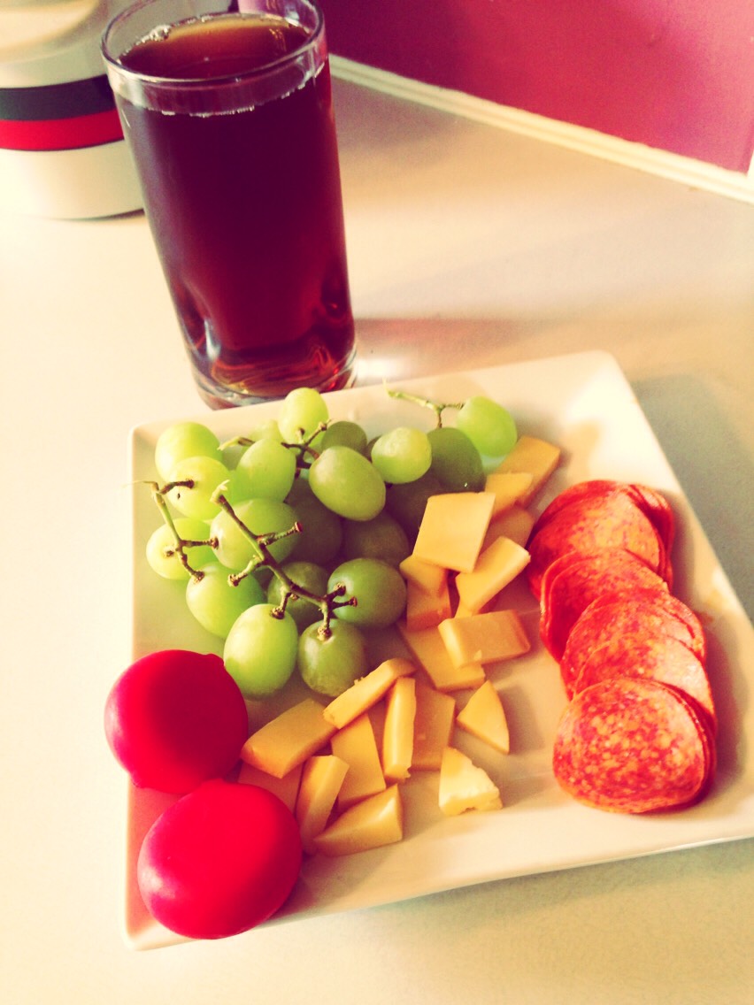 Tea, cheese,grapes, pepperoni. Makes for snacks while entertaining guests.