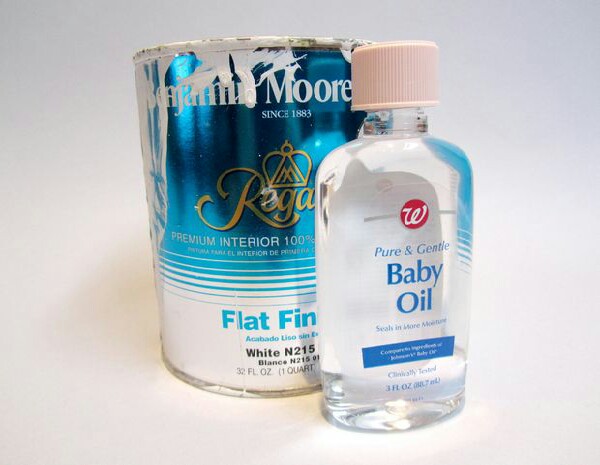 Gets latex paint of your hands,body just rub on the areas covered usin a cotton ball or napkin for outside in, in concentric circlesbut dont rub to hard.