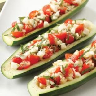 Stuffed cucumbers make for a great snack in between meals.

Get one or two cucumbers
Cut then in half (vertical) 
Scoop out the seeds or inside

Stuffing:
Cut tomatoes into small squared pieces (you'll only need one) 
Add some cilantro 
Onion
And some tuna (I prefer the caned tuna in water) 

Enjoy!