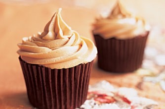 Method
Preheat the oven to 180ºC/fan 170ºC/350ºF/gas mark 4. Place the paper cases into a cupcake tin. In a heatproof bowl, pour 180ml boiling water over the dates and leave to soak for 20 minutes. Then, with a fork, gently break up the dates and stir in the vanilla.

