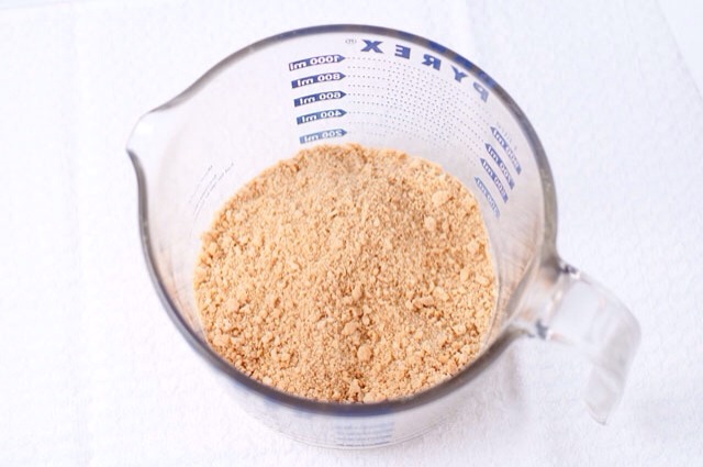 Break the graham crackers into the bowl of a processor, add the butter and 1 tablespoon of Nutella, and blitz until it starts to clump. Add 3 tablespoons of the hazelnuts and continue to pulse until you have a damp, sandy mixture.

Tip into a 9 inch springform and press. Place in fridge to chill ❄️⛄