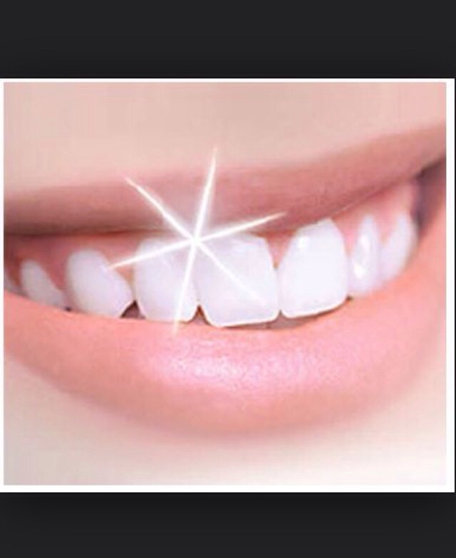 Brush your teeth as best as you can so there's nothing stuck between your teeth