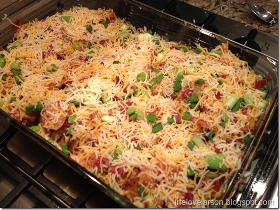 4.In a bowl mix together the cheese, bacon & green onion and top the raw chicken with the cheese mix. Return the casserole to the oven and bake for 15 minutes or until the chicken is cooked through and the topping is bubbly delicious. 
