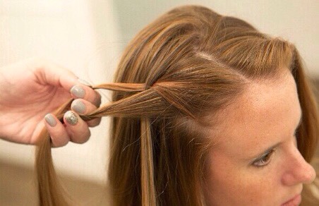 Drop the section of your hair you just placed so it falls through your twist creating the waterfall braid👄