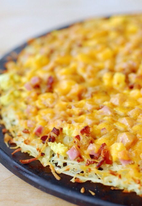 Breakfast pizza with hash brown crust