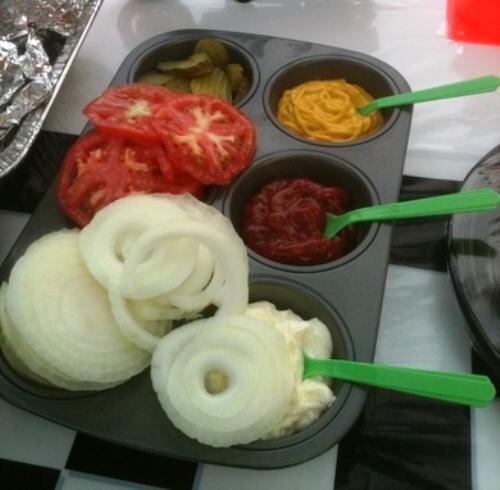 Use a muffin tray to serve condiments at a BBQ