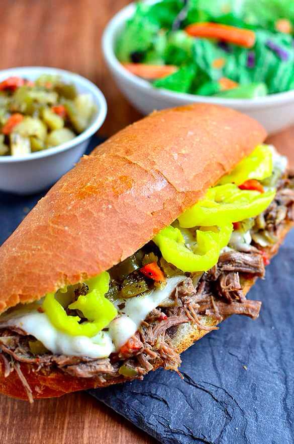 7. Crock Pot Italian Beef
Roast beef + broth + Italian seasoning mix + pepperoncinis + relish. (Plus, anything you'd like to pair it with, like hoagie rolls and cheese, or a side of fresh veggies.) Get the recipe.
http://iowagirleats.com/2013/10/23/crock-pot-italian-beef-sandwiches/