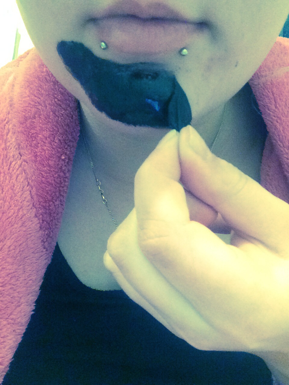 After it's completely dried you slowly peel the mask off and you can see all the blackheads on the mask.