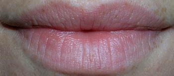 1. Start with clean, bare lips. (My lips are kind of dry, so I used lip balm and blotted it off to prime them without adding a layer that would affect color application).