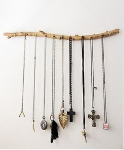 A cool looking stick found outside or from a local craft store. Add as many nails as you'd like to hold your necklaces 