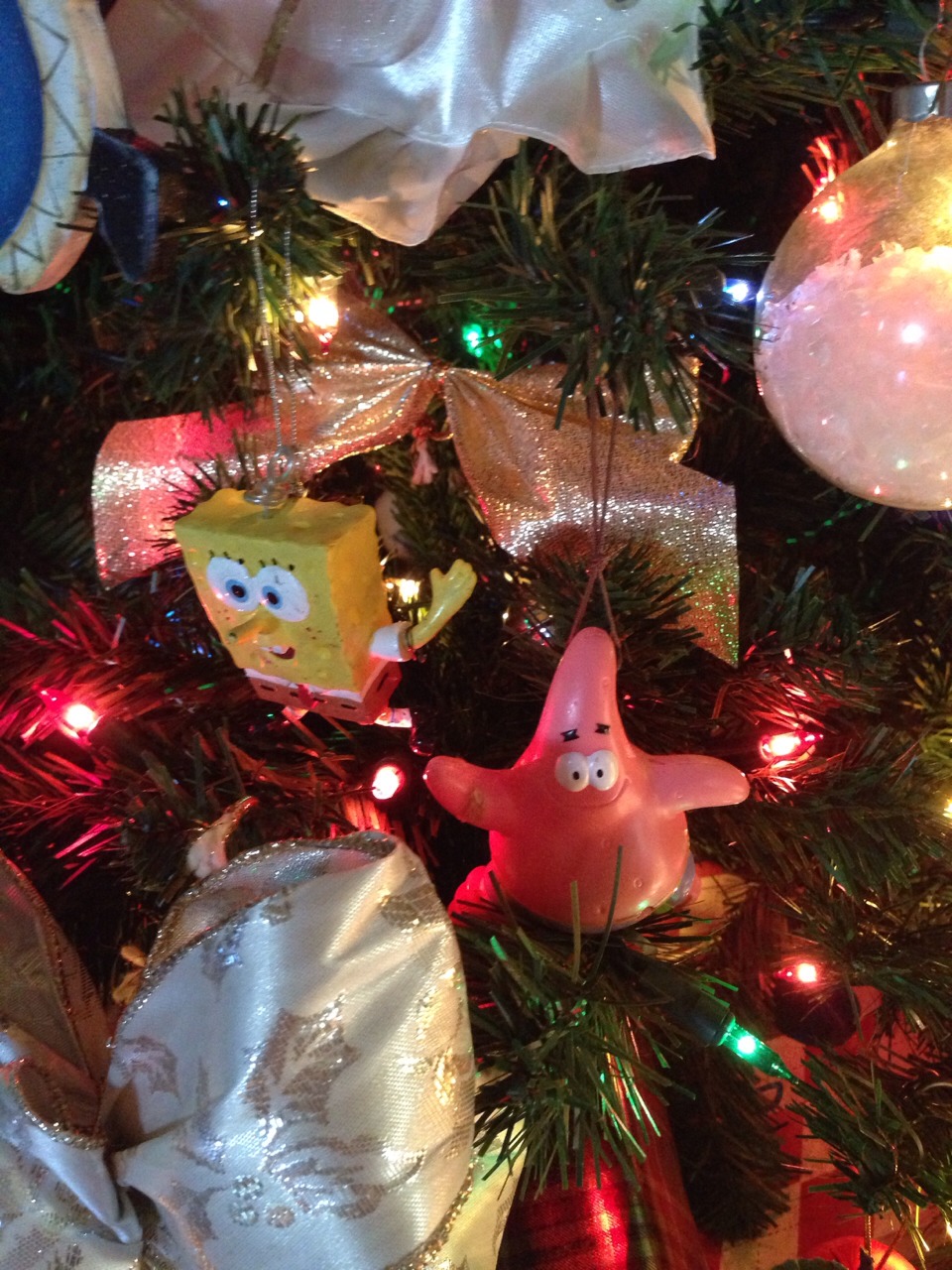 as my kids got older i use some of their favorite toys and glued string on them and use them as ornaments :)