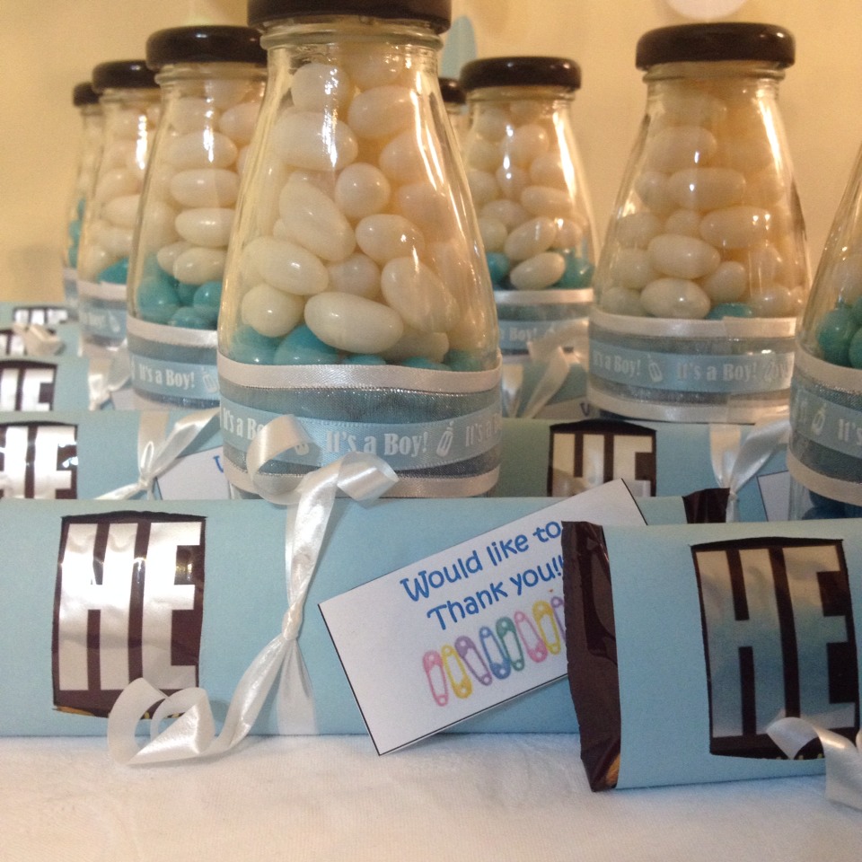 Jellybean filled milk bottles and Hershey bars for favors. 