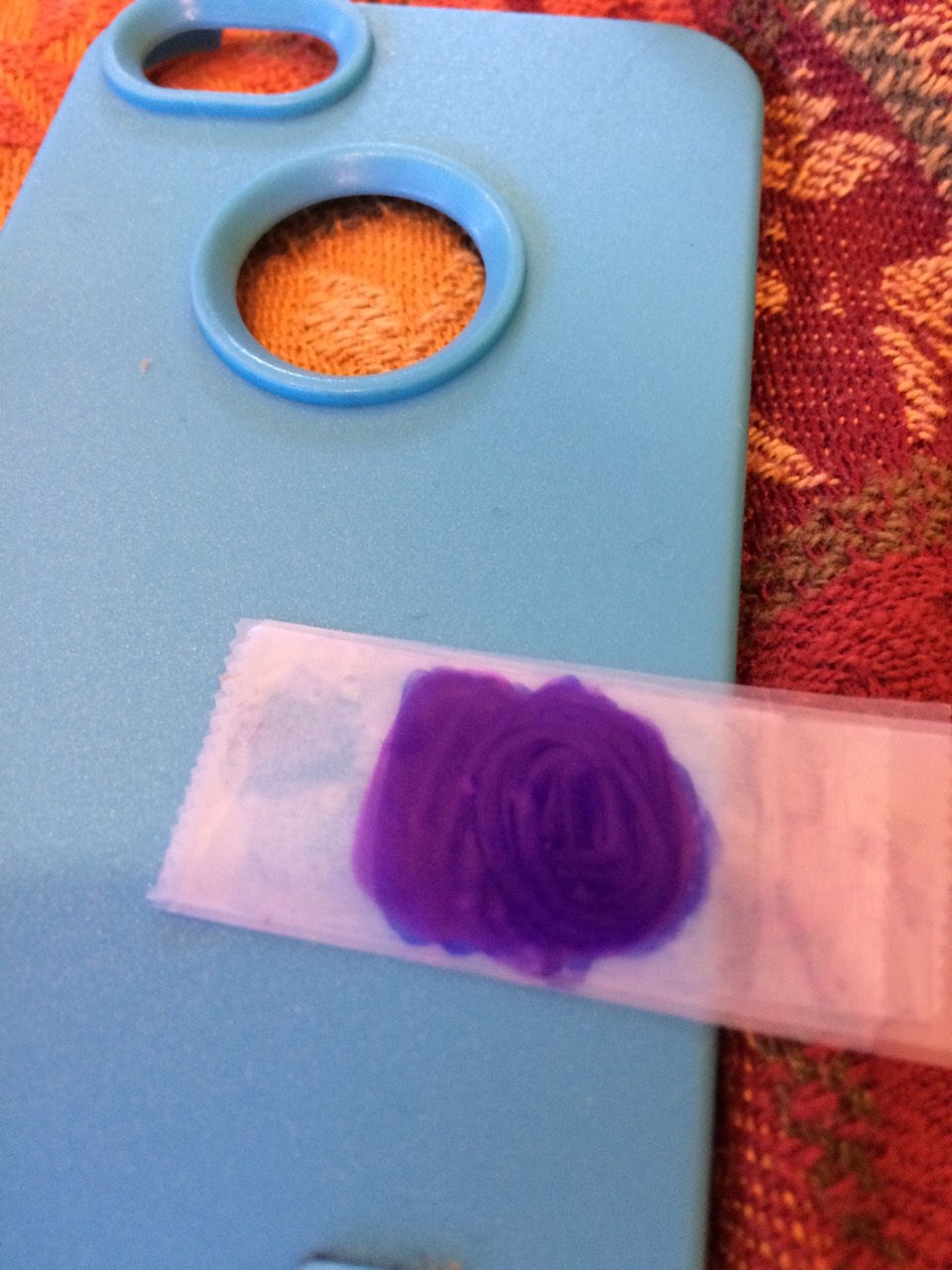 Then color the top layer (fourth layer of tape) purple. 