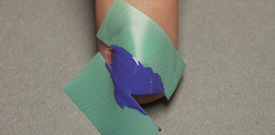 Just like last time, paint straight over the tape and immediately remove the tape.