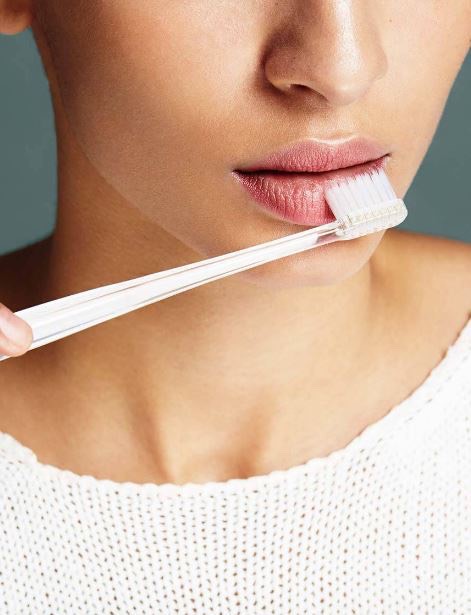 7. Brush your way to smoother lips.
If you brush your teeth – which hopefully everyone does – you can put down your wallet and stop buying lip scrubs. You can exfoliate your lips with a toothbrush! Simply apply a lip balm to your lips and then brush away the dead skin. Not only will this make your lips smooth and ready for lipstick, but it will also stimulate blood flow and cause a plumping effect!