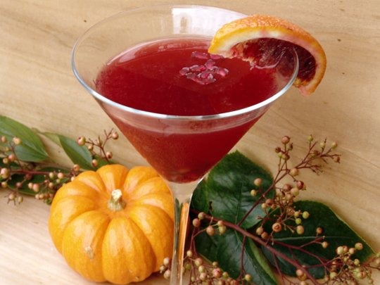 How to: 
- Mix all ingredients in martini shaker with ice. 
- Squeeze blood orange and lime wedge.
- Shake vigorously for 15 seconds and pour into chilled martini glass. 
- Garnish with pomegranate seeds and sugar coated blood orange slice.


