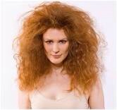 4.) Frizz-tamer: Use a tiny amount of coconut oil to smooth down flyaways and add shine to your locks.