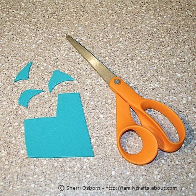 Cut fins for your fish out of craft foam. You can cut out simple triangle and trim them to fit, or cut out fancy, flowing fins.