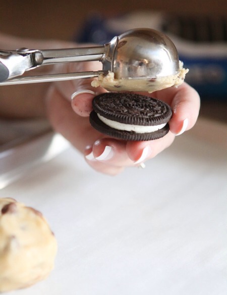 First things first, take a cookie scoopful of dough and place it on top of your Oreo Cookie

